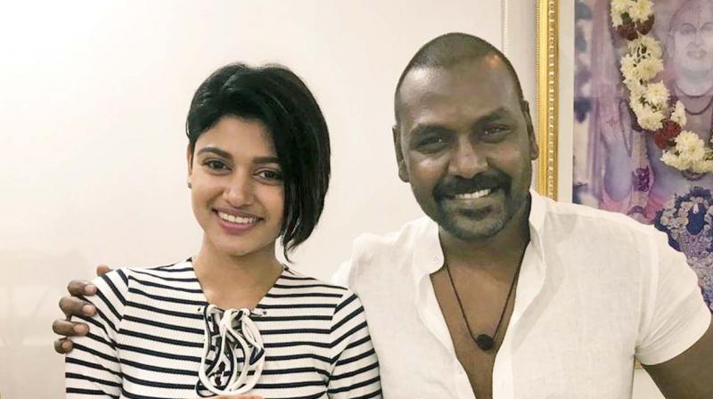 Oviya Helen with Kaanchana actor, director Raghava Lawrence