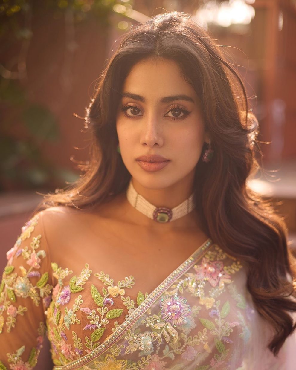 Close-up of Janhvi Kapoor's flawless makeup and radiant look in recent photoshoot.