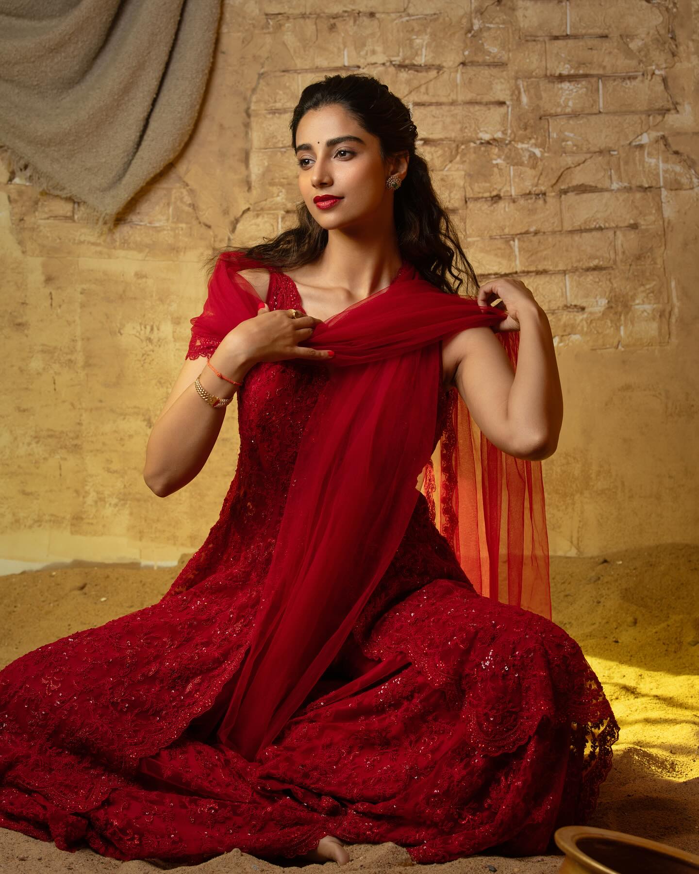Meenakshi Chaudhary Stuns in a Bold Red Outfit