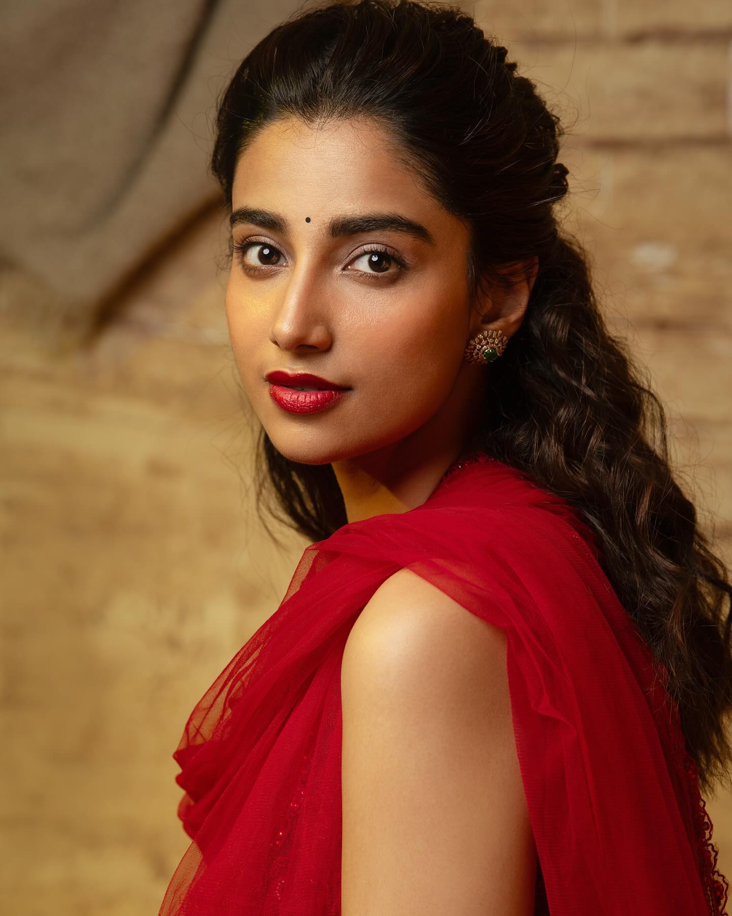 Meenakshi Chaudhary Stuns in a Bold Red Outfit