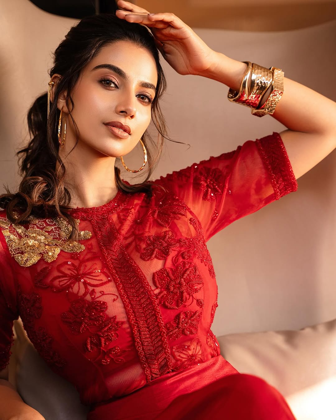 Meenakshi Chaudhary Stuns in a Bold Red Outfit