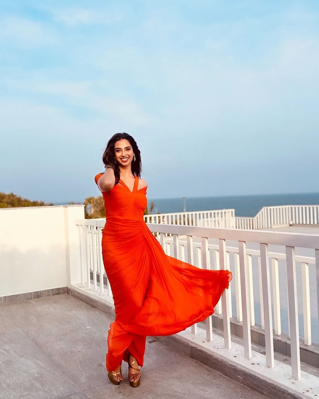 Meenakshi Chaudhary Glows in Golden Outfit