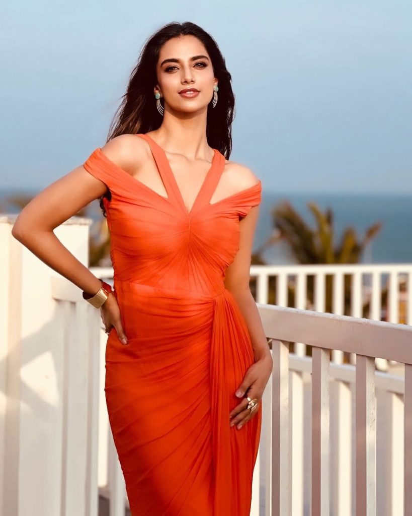 Meenakshi Chaudhary Glows in Golden Outfit