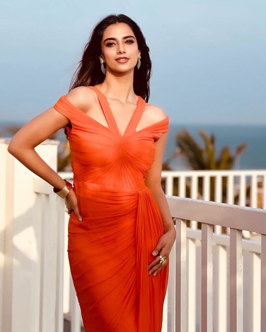 Meenakshi Chaudhary Glows in Golden Outfit