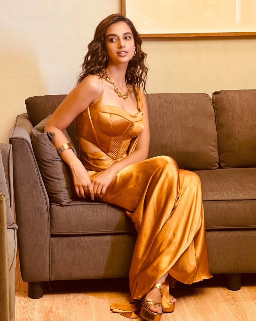 Meenakshi Chaudhary Glows in Golden Outfit