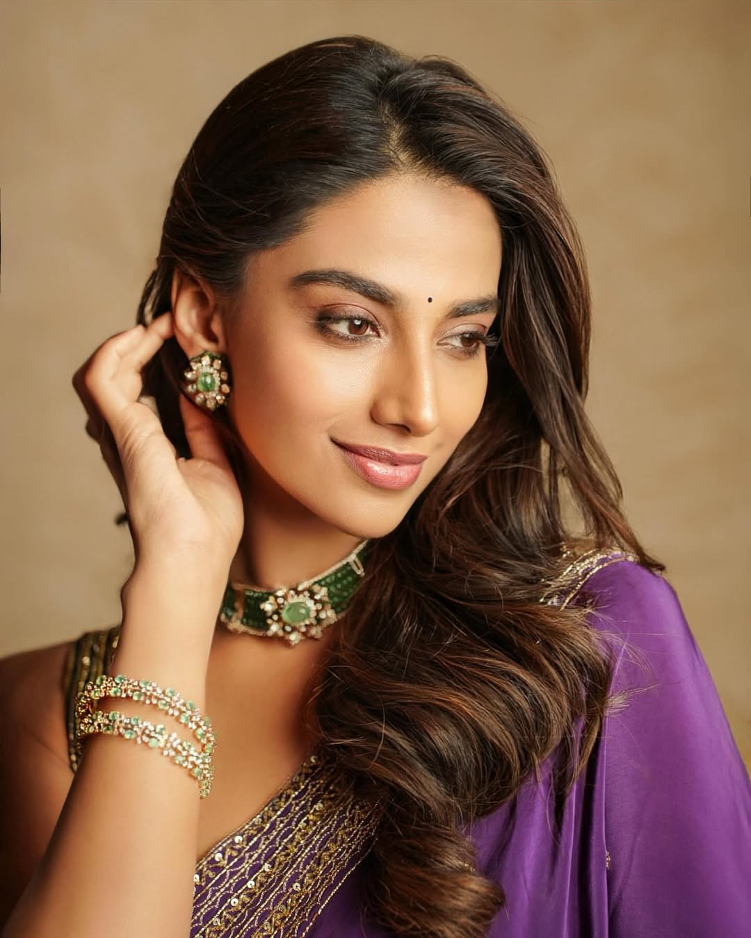 Meenakshi Chaudhary Glows in Golden Outfit