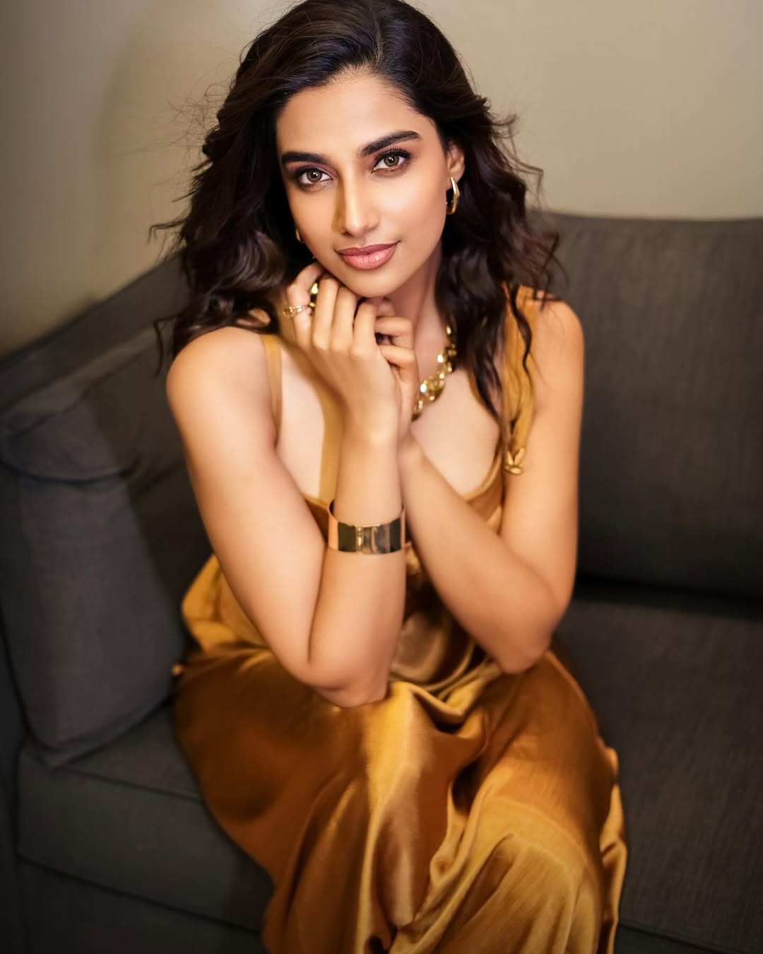 Meenakshi Chaudhary Glows in Golden Outfit
